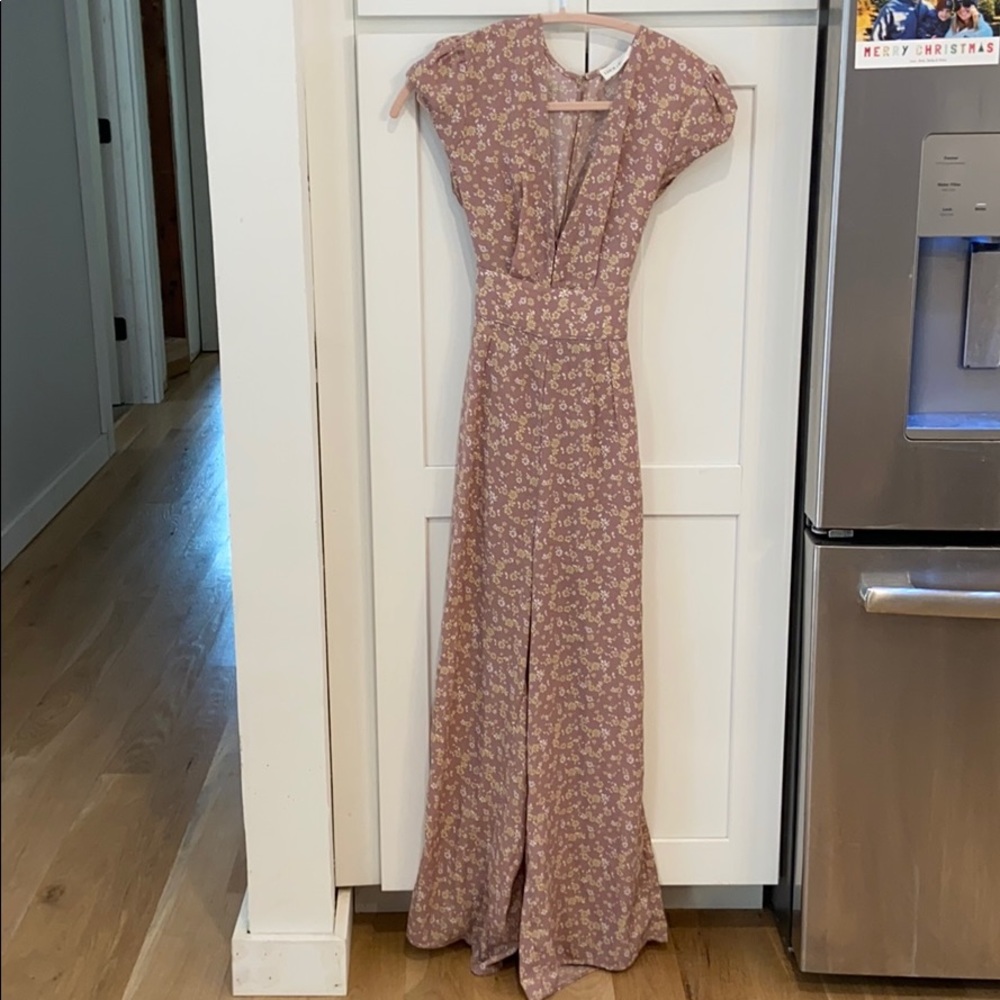 Floral jumpsuit with bow tie back